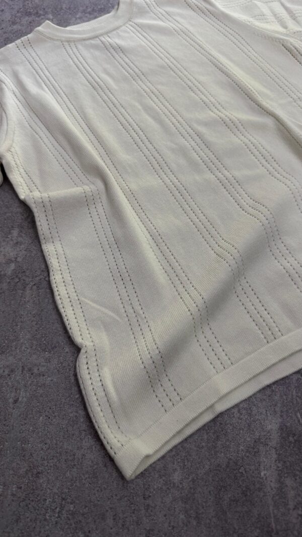 REMERA "ESSENTIAL KNIT"